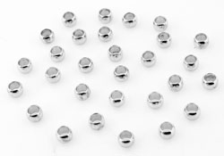 Perle à écraser en métal. Diamètre: +- 3mm. Utile pour la finition stopper les fils au fermoir. Code: D10077 --- Perle a ecraser nickel 3mm.---