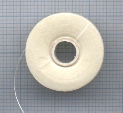 Code: FBB250    --- Fil nymo 3mm. Blanc 58 m.---