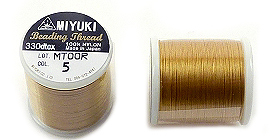 Code: D14132    --- 50 m.Miyuki Fil Nylon MNT-05, 330dtex. Gold---