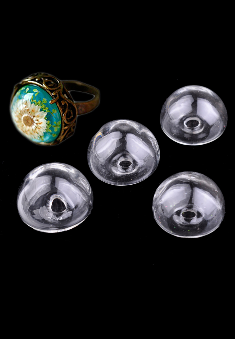 Brique de collage de verre, circulaire ± 27x18mm (trou ± 4mm). Couleur: Transparent Code: D17828 --- Demi Perle verre, circulaire ±27x18mm Transparent ---