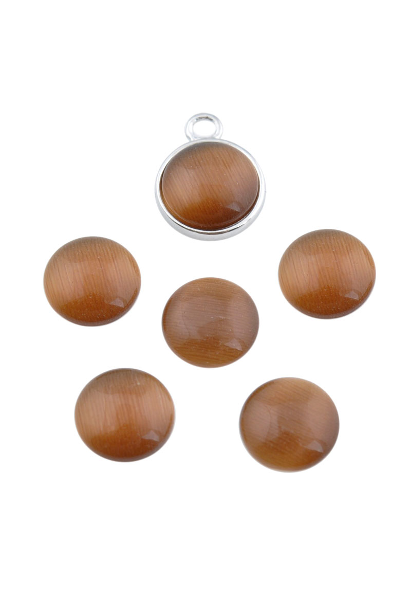 Cabochon en verre, cateye 10mm, 3mm gros. Couleur: Marron Code: D18666 --- Cabochon en verre, cateye 10mm, 3mm gros Marron---
