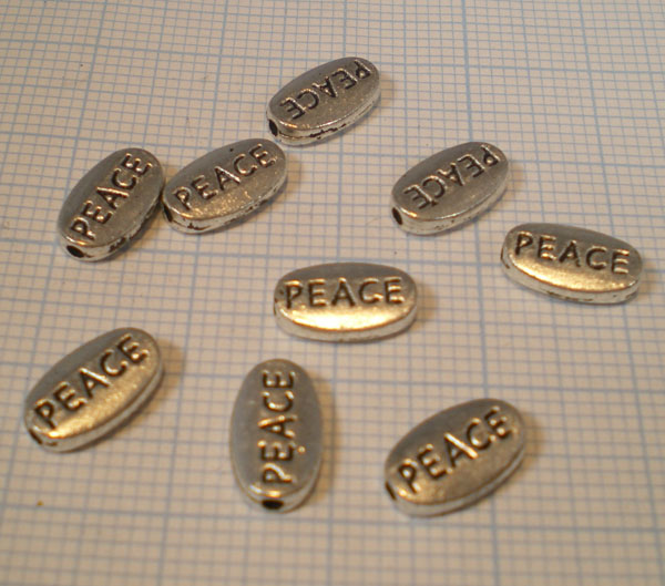 Peace oval 10mm. Argent Vx.