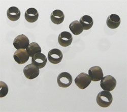 Perle a ecraser 2mm. Or vieux-bronze