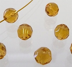 Verre facettes 8mm. topazee clair