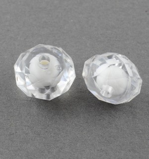 Perle acrylique demi transparente. Toupie de +- 6x8mm. Trou : 2mm