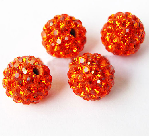 Superbe perle ronde scintillante de strass. Convient parfaitement pour les Shamballa. 10mm de diamètre. Couleur: StrassOrange Code: B82517 --- 10mm. Disco Ball Strass Orange---