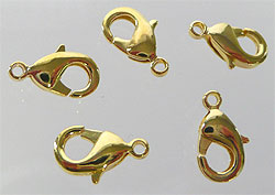 Fermoir oval de couleur dorée. +-12x7mm. Mousqueton
-----Cliquez sur la photo pour l'agrandir----- Code: D00143 --- Fermoir 12x7mm. Dore---