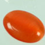 Code: D03758    --- Cateye A coller ovale 14x10mm. Orange-rouge---
