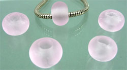 Code: D04698    --- Verre rondelle Trou 5mm. 14X10 Rose clair---