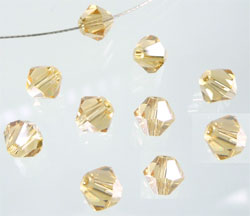 Code: D04818    --- Verre toupie facettes 8mm. Topaze clair---