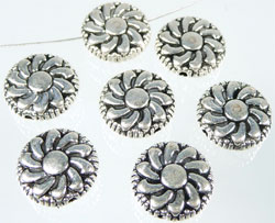 Code: D06338    --- Perle metal plat fleur 12mm.---