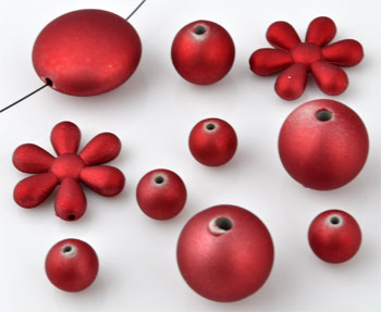 Mélange de perles en matière synthétique. Grandeur: entre 10 et 25mm. La couleur est satinée. Sachet de +-90 Pièces. Couleur: Rouge Code: D09244 --- Vrac synthetique 10-25mm. +- 90Pcs Rouge---