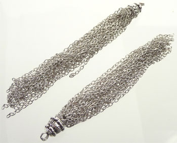 Code: D07896    --- Pompon  metal, Pampille +- 10cm. Nickel---