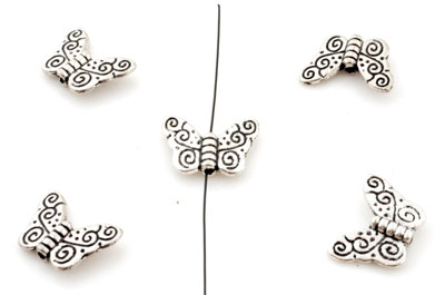 Perle en métal en forme de papillon décoré. Dimensions: +- 15x11mm. Trou: +- 1,5mm. Couleur: Argent vieux Code: D12433 --- Papillon Metal 15x11mm---