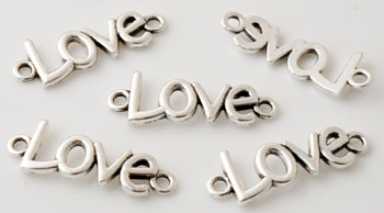Pendentifs/entre-deux de métal 'Love' ± 34x11mm (yeux ± 2mm). Couleur: Argent vieilli Code: D14834 --- Entre-Deux metal Love 34x11mm. Vx Argent---