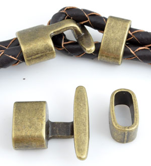 Fermoir de métal ± 20x22mm et ± 13x7mm (trou ± 10x5mm) Code: D11696 --- Fermoir metal 20x22 et 13x7 bronze---