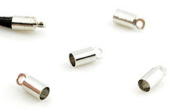 Calotte en métal +- 9x4 mm. Trou: +- 3,5mm. Oeil: +- 1mm. Couleur: Nickel Code: D12231 --- Calotte metal avec oeil 9x4mm. Nickel---
