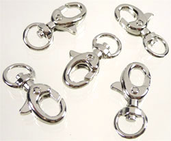 Code: D07983    --- Porte clef metal 30x15x7mm. Nickel---