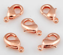 Fermoir mousqueton en métal de +- 12x7mm. (œil+- 1mm.) Couleur or rose Code: D11289 --- Mousqueton metal +- 12x7mm. Couleur or rose---