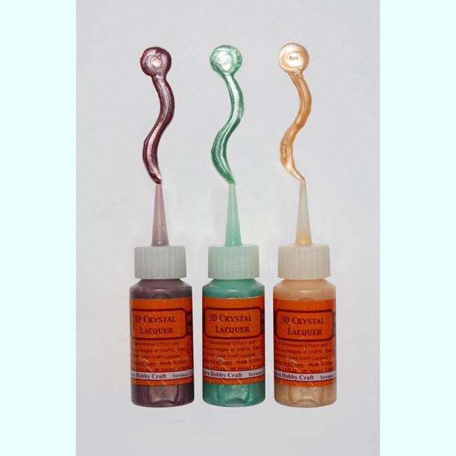 This set includes three 1.0 oz containers of 3D Crystal Pearl Color Lacquer in a cute and convenient PVC Carrying Bag. Colors included are Dark Brown Pearl Turquoise Pearl and Orange Pearl. Code: 03036 --- 3D Crystal Lacquer Pearl Color Set (D)---