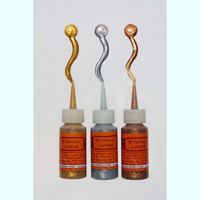 Cet ensemble comprend trois conteneurs de 1,0 oz de 3D ??cristal métallisé Couleur laque dans un PVC mignon et pratique sac de transport. Couleurs incluses sont d'or d'argent et de bronze. Code: 03051 --- 3D Crystal Lacquer Metallic Set---
