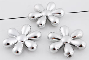 Perle de matière synthétique. Métal Look. Fleur de +-23x6mm. Couleur Nickel Code: D09328 --- Synthetique. Metal Look. Fleur 23x6---