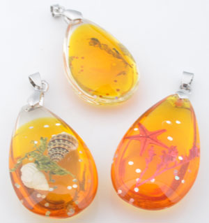 Code: D10059 (Bouteille Coquillages 62x19mm. Orange-Jaune) 