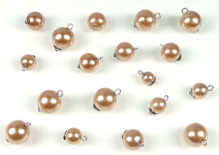 Mélange de perles synthétique, avec clou avec œil et calotte. Entre 8 et 16 mm. Sachet de +- 80 pièces. Couleur: Marron Code: D10493 --- Melange perles avec clou. Marron---