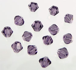 Code: D04787    --- Verre toupie 4mm avec facettes Tanzanite---